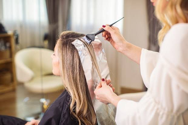 Hair colour being applied